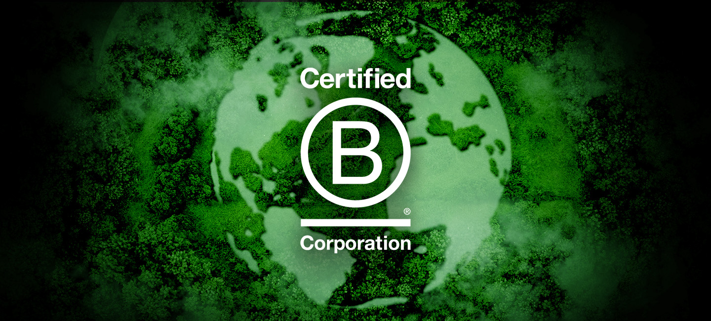 Certified B Corp logo against a green background featuring an outline of the earth