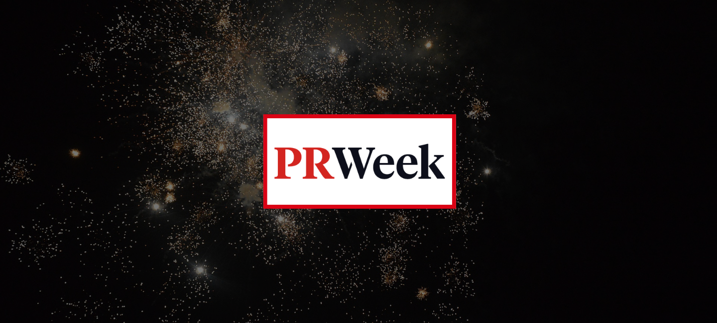 PRWeek logo against a sparkly background